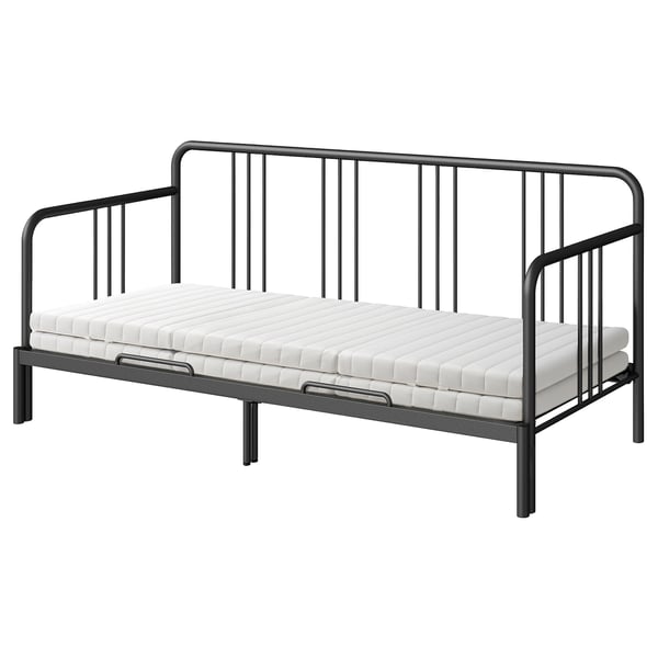A black, metal FYRESDAL day-bed with a white mattress, suitable for space-saving and versatile use.