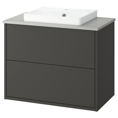 IKEAs HAVBÄCK grey bathroom washstand: modern dark grey design, featuring a semi-recessed sink, sturdy construction, and ample storage in drawers.