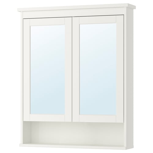 A white HEMNES mirror cabinet with two doors and a glass shelf. It’s rectangular with clean lines and a modern design, perfect for bathroom storage.