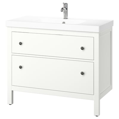 White HEMNES bathroom vanity with drawers and chrome tap.