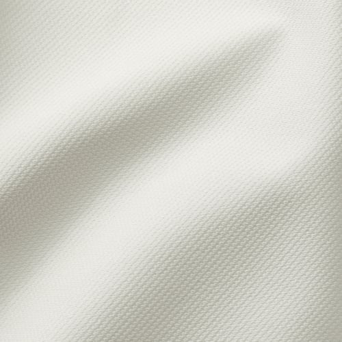 Close-up of soft, textured, woven fabric, likely a furniture cover, displaying durability and comfort.