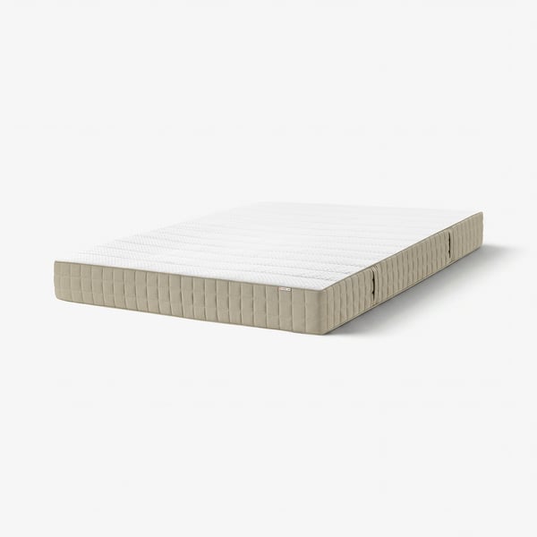 A neutral-colored, rectangular MAUSUND mattress with linen and cotton cover, and natural fillings. Its designed for comfort and breathability.