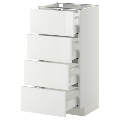 A white METOD kitchen cabinet with four drawers. It a sleek, modern design with high-gloss drawer fronts and a sturdy frame.