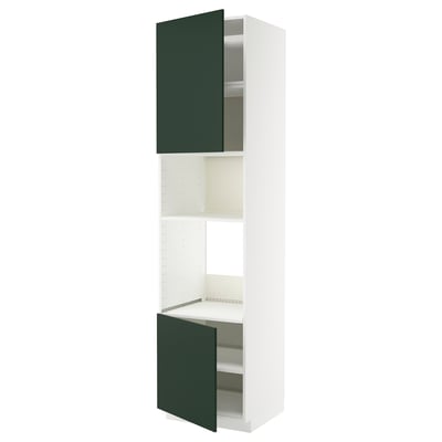 A white METOD kitchen unit with green havstorp doors, both open, revealing shelves.