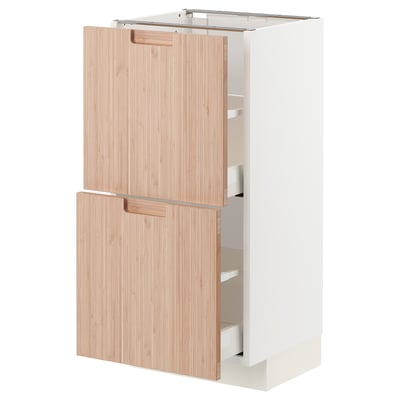 White METOD kitchen cabinet with natural bamboo doors and drawers.