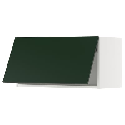 METOD kitchen cabinet with dark green door and white frame.