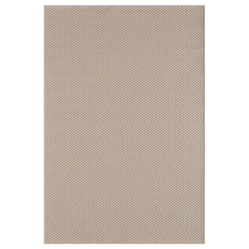 A MORUM rug in beige with a textured pattern, suitable for indoor and outdoor use.