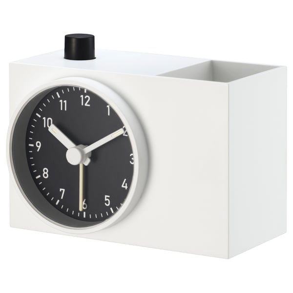 ÖKENMARSVIN alarm clock: black round face with white numbers, minimalist white casing.