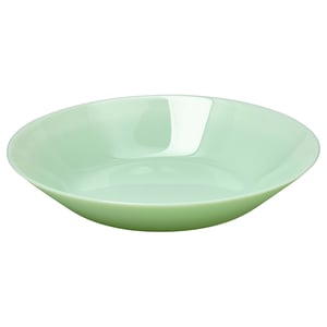 Light green glass bowl, simple design, smooth edges, ideal for serving.
