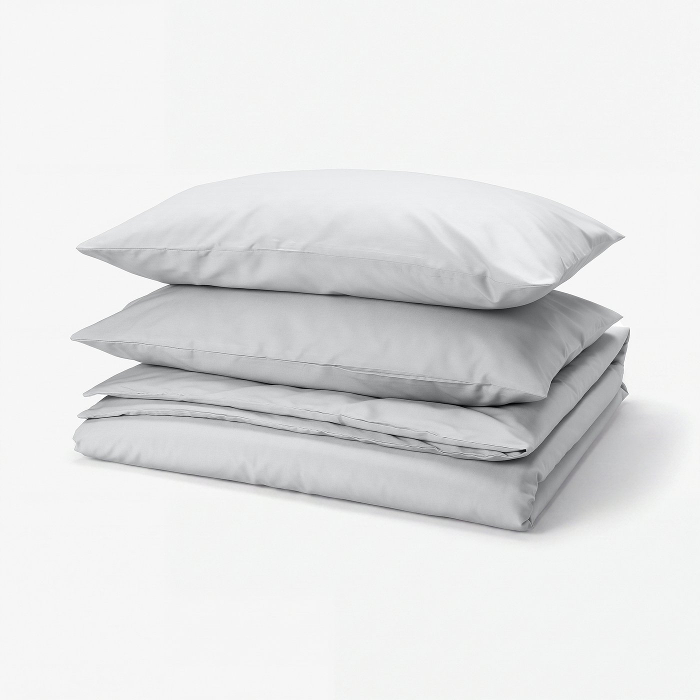 Light grey bed set, neat stack of three pieces, smooth finish, rectangular and folded.