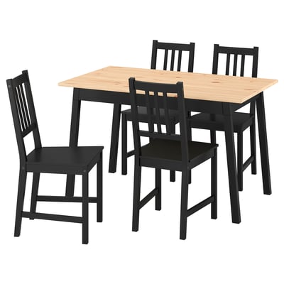 PINNTORP dining set: light wood table, 4 black chairs, simple design, solid pine.