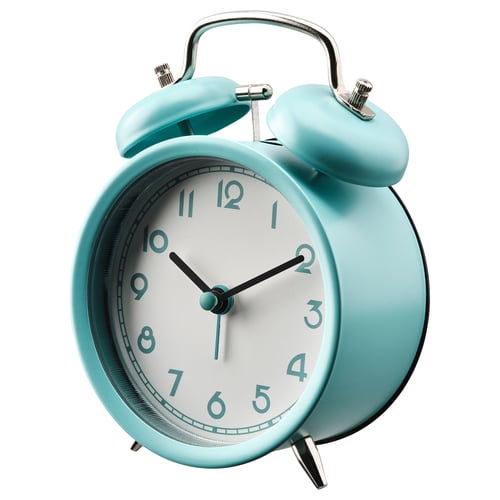 A mint green silent alarm clock with two bells, round shape, white face, black hands, and glass cover.