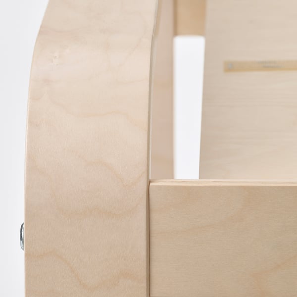 Close-up of a smooth, light-colored wooden footstool, showcasing high-quality craftsmanship and glossy finish.