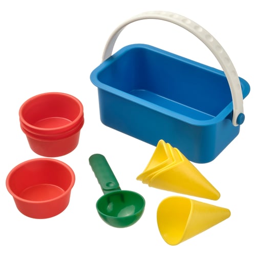A colourful plastic beach toy set, including a blue bucket, red cups, a green scoop, and yellow cones, perfect for sand play.