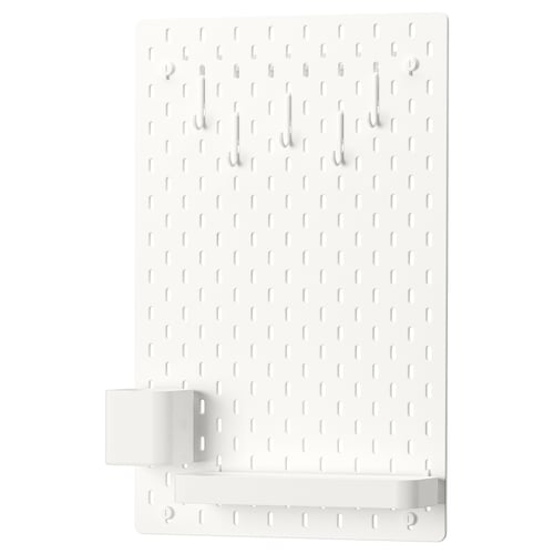 SKÅDIS white pegboard with hooks and shelf, wall-mounted storage.