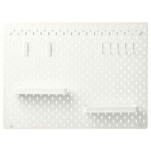 SKÅDIS white pegboard with hooks and shelves for organising.
