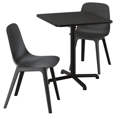A black STENSELE table set with a square table and two chairs. The table has a star base, and the chairs have a curved seat and four legs.