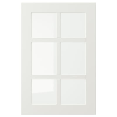 White STENSUND glass-door cabinet, rectangular with lacquered finish and tempered glass panels.