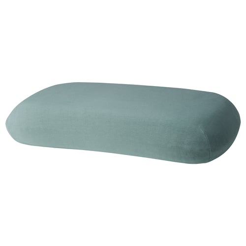 A teal TÖCKENFLY pillow with soft, stretchy fabric, featuring a smooth edge design for comfort.