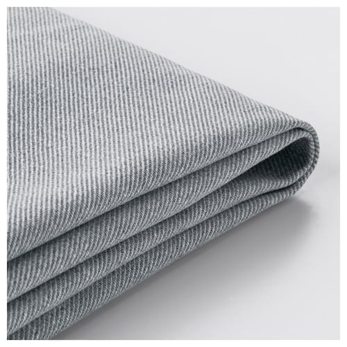 Folded grey fabric close-up, showcasing texture and quality, likely a machine-washable cover.