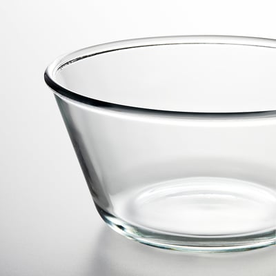 A clear glass bowl named VARDAGEN, with a simple and round design, perfect for serving food.