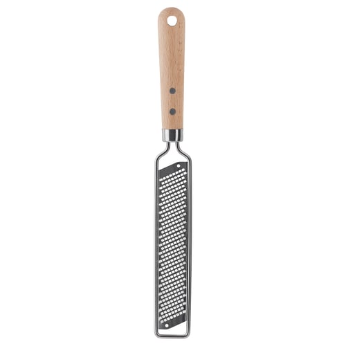 A VARDAGEN grater. It has a light wood handle and a stainless-steel grate. Designed for zesting citrus and grating cheese, it a handy hanging hole.