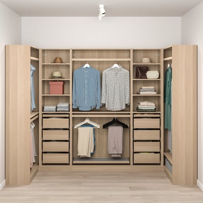 Wooden closet with clothes, drawers, and shelves, spacious and organised.