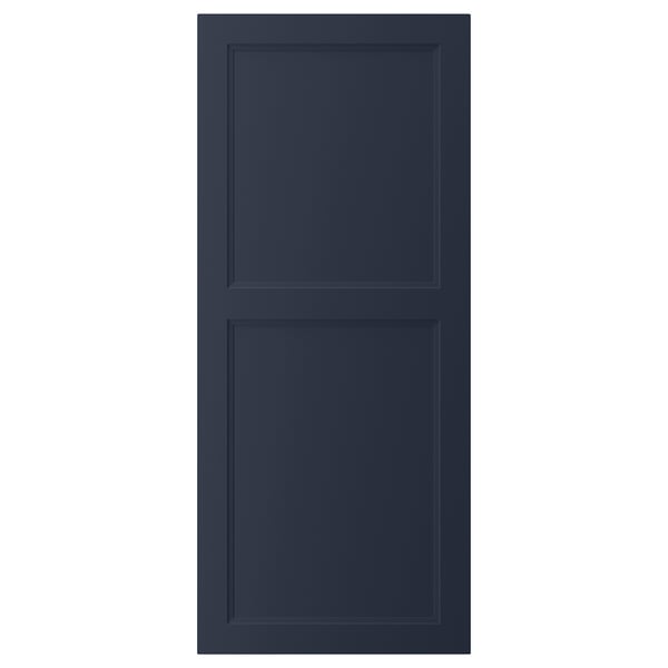 A blue AXSTAD kitchen cabinet door, featuring a smooth, indented panel design with a modern, sleek appearance.