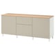 White BESTÅ sideboard with oak top, six vertical panels, two drawers, adjustable shelves, four legs.