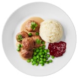 Mit Fleischbällchen, Erbsen, Kartoffelpüree und Marmelade anrichten.