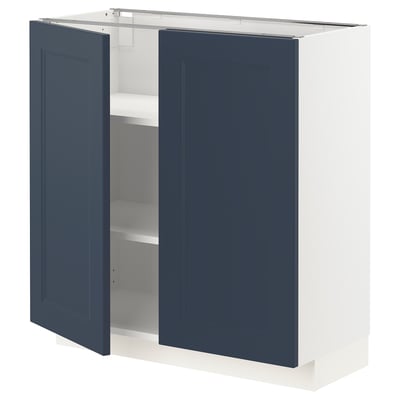 METOD kitchen cabinet in blue with two doors open, white frame, adjustable shelves.