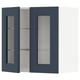 Blue glass-doored METOD wall cabinet.