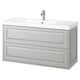 TÄNNFORSEN vanity in light grey with beveled edges. Modern, wall-mounted design with two spacious drawers. White ceramic sink and chrome faucet.
