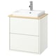 Modern white bathroom cabinet with light wood counter, rectangular sink, chrome faucet.
