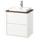 White bathroom vanity with wooden counter, ceramic basin, chrome faucet, modern design.