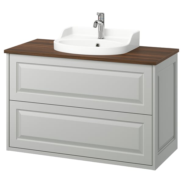 The TÄNNFORSEN wash-stand in light grey with wooden countertop and white ceramic sink, featuring two drawers and beveled edges for a crafted look.