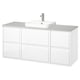Modern white bathroom vanity by ÄNGSJÖN, sleek with drawer storage, light quartz countertop, single vessel sink, chrome fixtures.