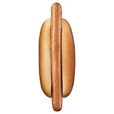 A plant-based hot dog, ready to eat. Served in toasted bread with a mild smoky flavor.