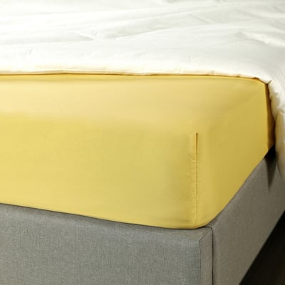 A yellow BRUKSVARA fitted sheet made from recycled polyester, designed to fit mattresses up to 16 cm thick.