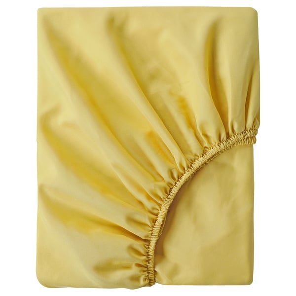 A yellow BRUKSVARA fitted sheet made from recycled polyester, designed to fit mattresses up to 16 cm thick.