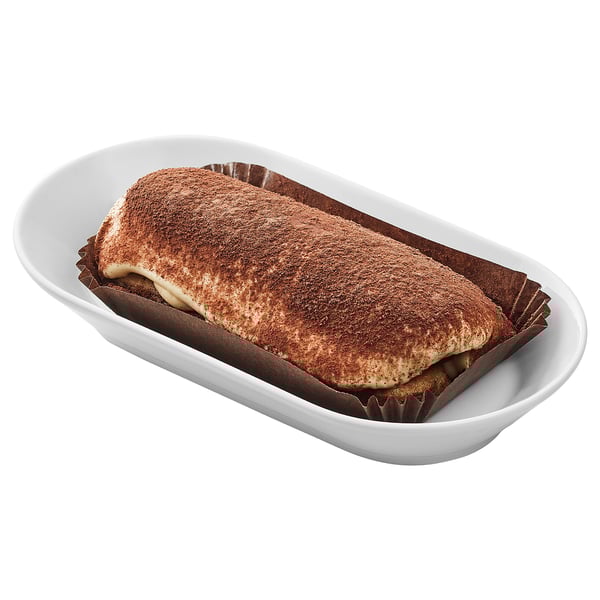 Plate with dessert, cocoa powdered cake.