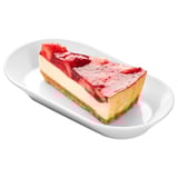 Slice of strawberry cheesecake on plate. Creamy filling, lemon zest, and crumbly crust with strawberry topping.