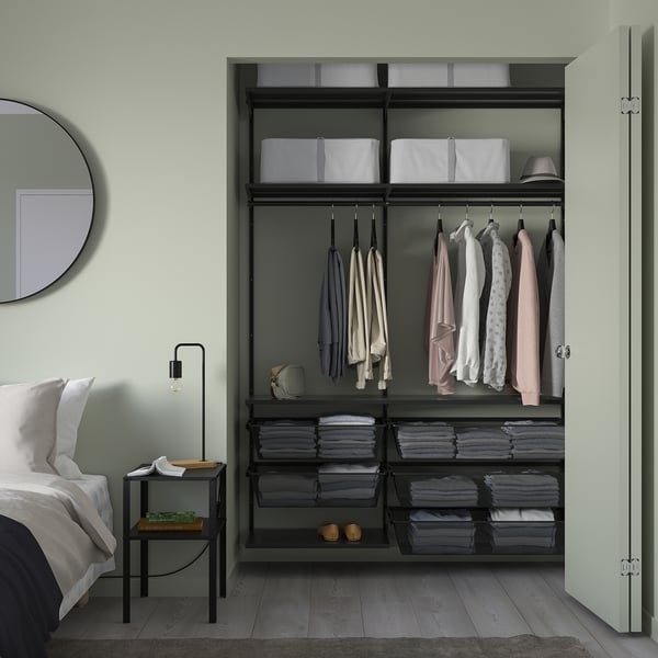 BOAXEL closet with clothes & stool in bedroom