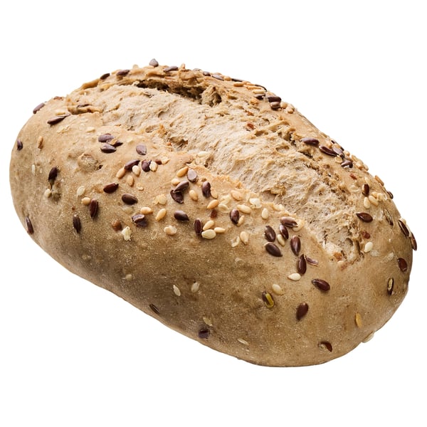 Round bread loaf topped with assorted seeds.