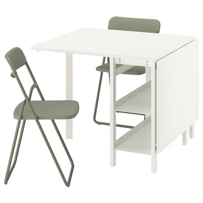 Foldable dining table with green chairs, minimalist design. Character count: 47