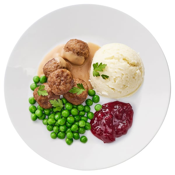 Mit Fleischbällchen, Erbsen, Kartoffelpüree und Marmelade anrichten.