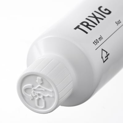 A white tube of TRIXIG repair filler, 150ml, with a black cap, containing 15 languages on the label.