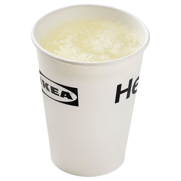Drink in IKEA cup with foam top. Light yellow beverage.