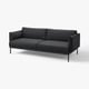 Nowoczesna sofa z węglem, minimalistyczny design, metalowe nogi, miękkie siedzenia i oparcie.