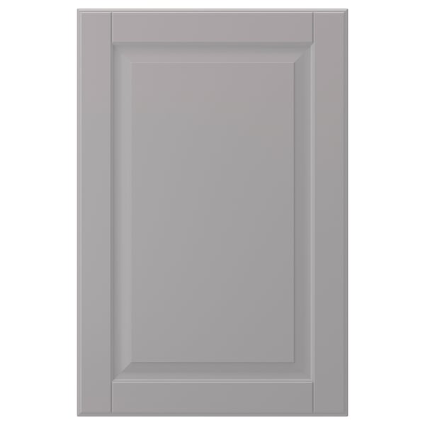 Szare drzwi szafy BODBYN z gładkim, fazowanym panelem.